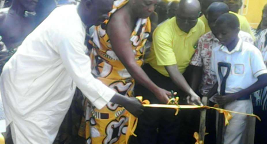 Nana Antwi Adjei Cutting The Tape Assisting By Manager And The MP