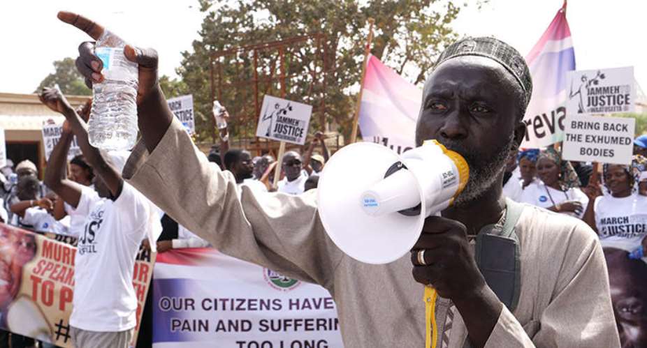A demonstrator is seen in Banjul, Gambia, on January 25, 2020. Two radio stations were recently shut down and their staffers arrested over their coverage of the protests. AFPRomain Chanson