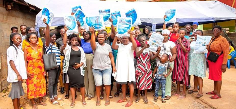 ASA Savings and Loans holds free health screening for Teshie clients; shares mosquito nets