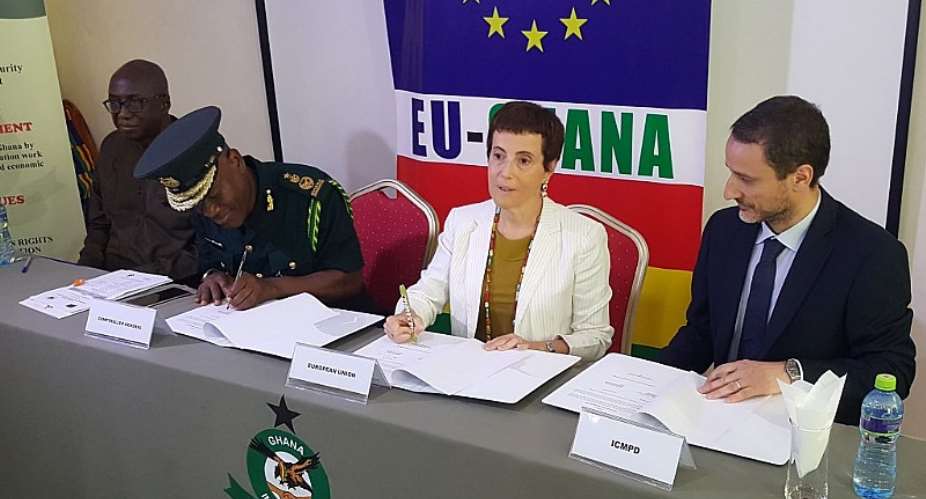 The Controller General Of Immigration, Kwame Asuah Takyi,2nd from left Ambassador Diana Acconcia and Marco Bordignon, Project Manager of ICMPD signing the MoU between ICMPD and GIS
