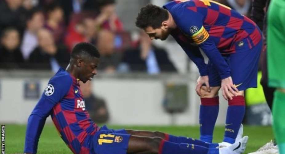Ousmane Dembele was consoled by Lionel Messi after injuring his thigh against Borussia Dortmund