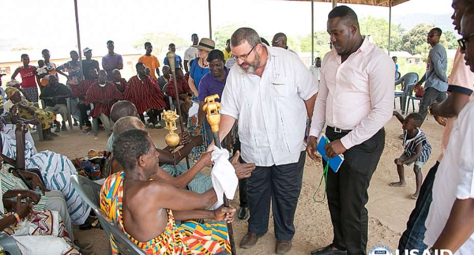 USAID at Radio Dayi: USAIDGhana Mission Director Andy Karas is welcomed to the Aveme Community, where he took part in a health promotion event organized by community radio station Radio Dayi. USAID supports training for staff of community radio statio