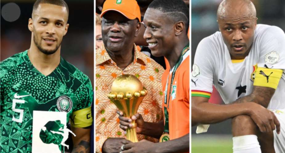 GETTY IMAGESImage caption: Ivorian President Alassane Ouattara got his hands on the trophy alongside co-captain Max Gradel