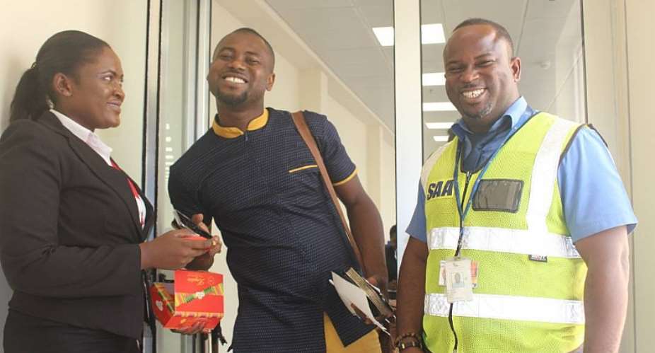 Staff of Ghana Airport presents chocolates to Abeiku Santana  on Val's Day