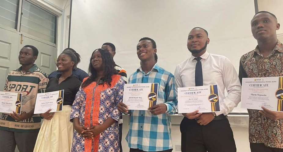 Dr. Augustina Dede Agor with the awardees of the Best Programming Team and other recognized students, following the award ceremony for their exceptional performance and dedication to excellence in programming.