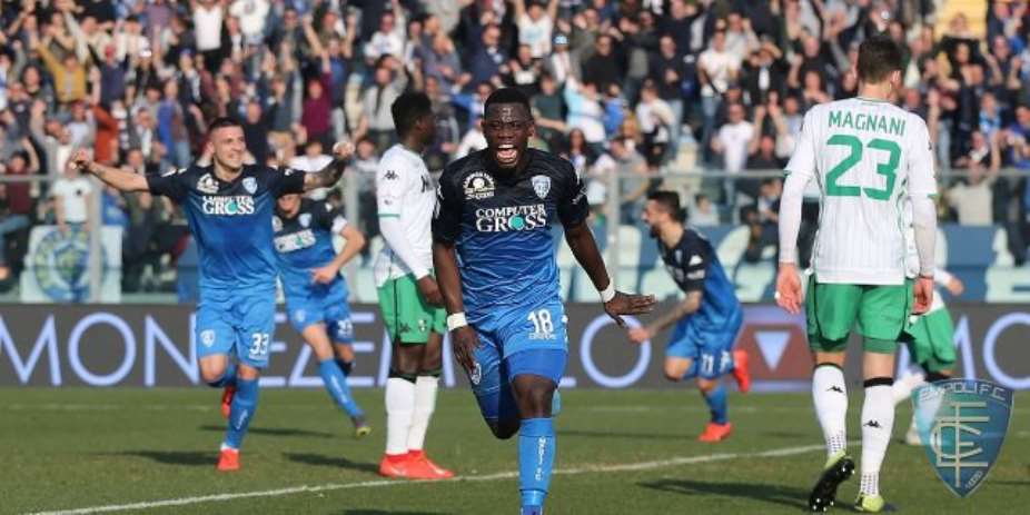 Afriyie Acquah celebrates scoring Empoli's second goal against Sassuolo