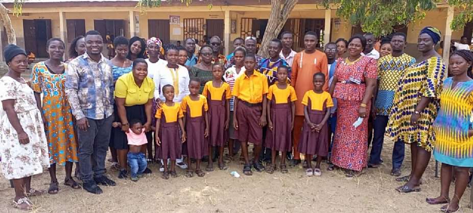 Cooperate organization donates school uniforms to pupils in Anloga District