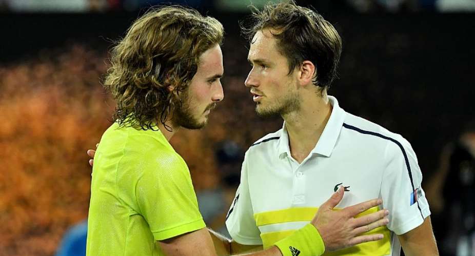 Russia's Daniil Medvedev R and Greece's Stefanos Tsitsipas greet each other after their men's singles semi-final matchImage credit: Getty Images