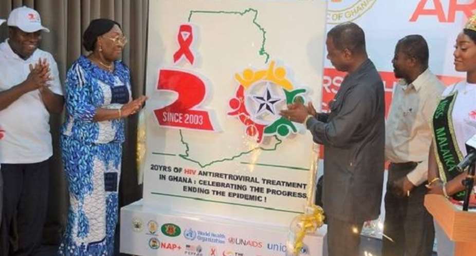 Dr Patrick Kuma Aboagye third right, Dr Mokowa Blay Adu-Gyamfi second left, Presidential Advisor on HIVAIDS, and others unveiling the logo