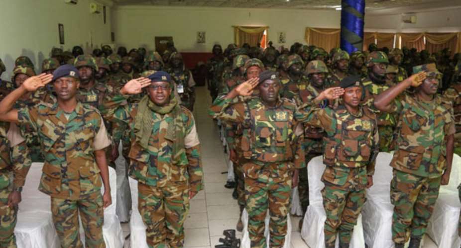 The soldiers saluting the Commander in Chief