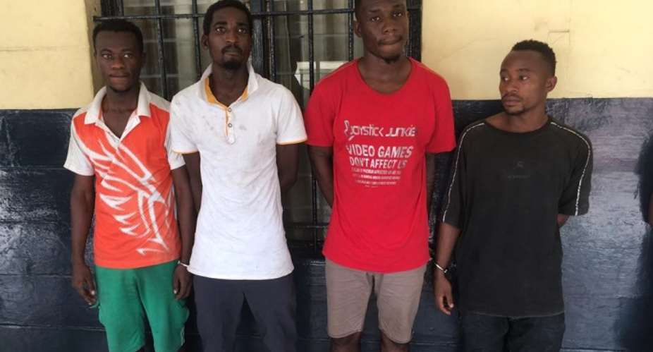 The four suspects in police custody