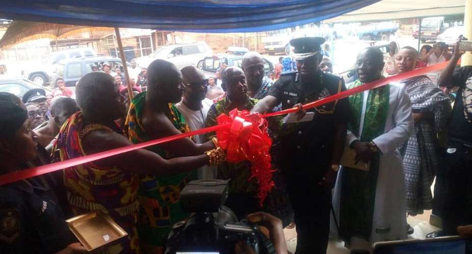 COP Ken Yeboah, Hon. Simon Osei Mensah and other dignitaries cutting the tape to open the police station