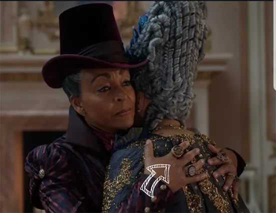 Adjoa Andoh hugging Queen Charlotte