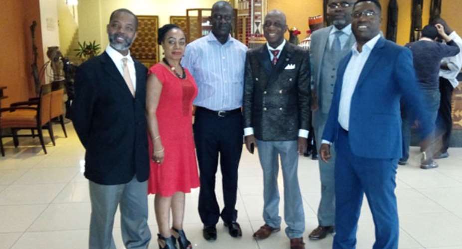 Yaw Busia left, Mr Etchi, Dr Thomas Mensah, Chairman of Light Wave SkyMax third right and other executives of Delta3 International in a pose on the sidelines of the workshop