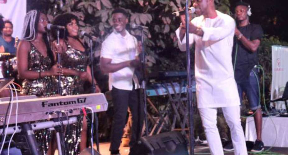 Kwabena Kwabena performing on stage