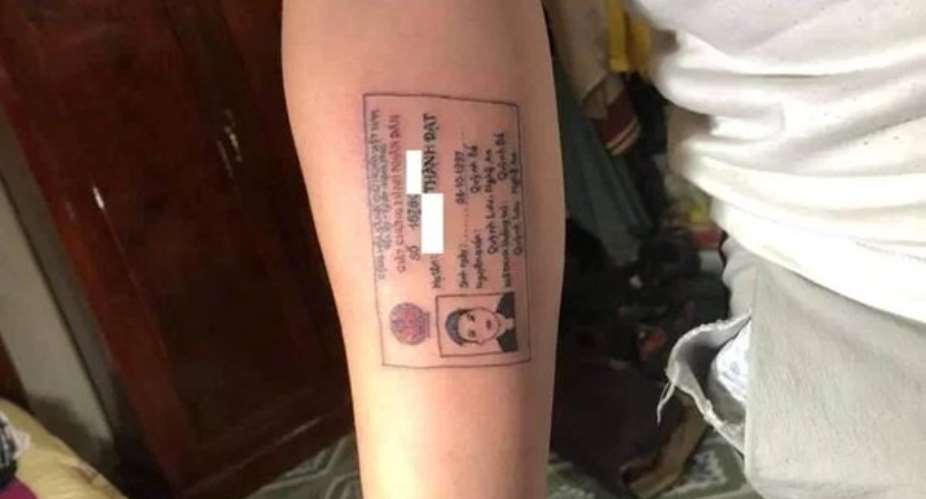 Vietnam Guy Tattoos ID Card On His Forearm