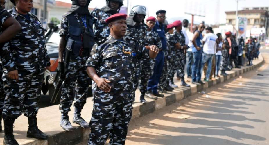 Police officers are deployed on March 31, 2018, in Freetown, Sierra Leone. Solomon Maada Joe, head of news at the privately owned Radio Bo KISS 104 FM, was arrested by police on February 7, 2022. Olivia AclandReuters