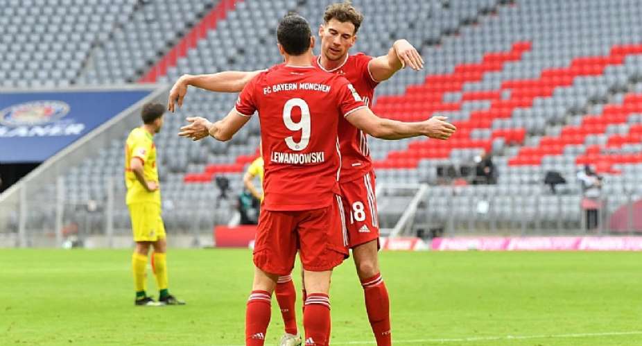 Bayern Munich's Polish forward Robert Lewandowski L and Bayern Munich's German midfielder Leon GoretzkaImage credit: Getty Images