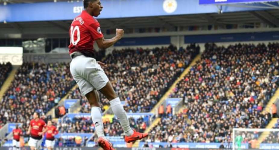 Marcus Rashford celebrates his ninth-minute goal. Photograph: Ben Stansall/AFP/Getty Images