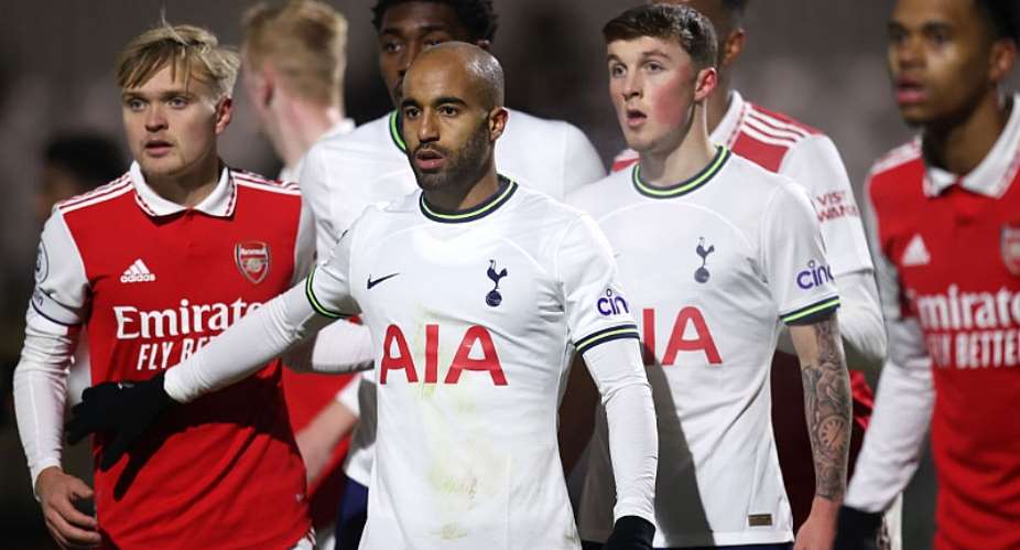 Tottenham Hotspur play Arsenal in a Premier League match in 2023, kit heavily branded. - Source: Alex Pantling/Getty Images
