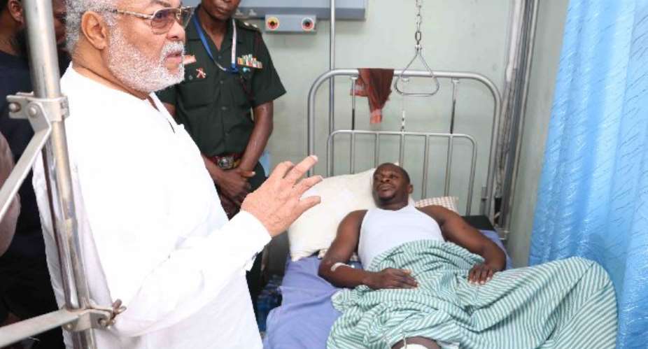 Flt Lt Rawlings makes a point during the visit to Yaro Ishawu at the 37 Hospital.