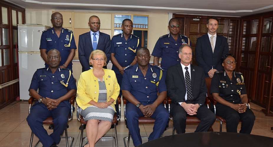 The Acting IGP in group photographs with his Canadian guests