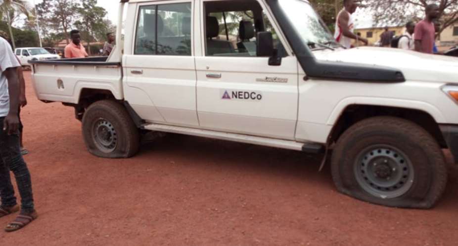 Berekum youth deflect NEDCo vehicle tyres.