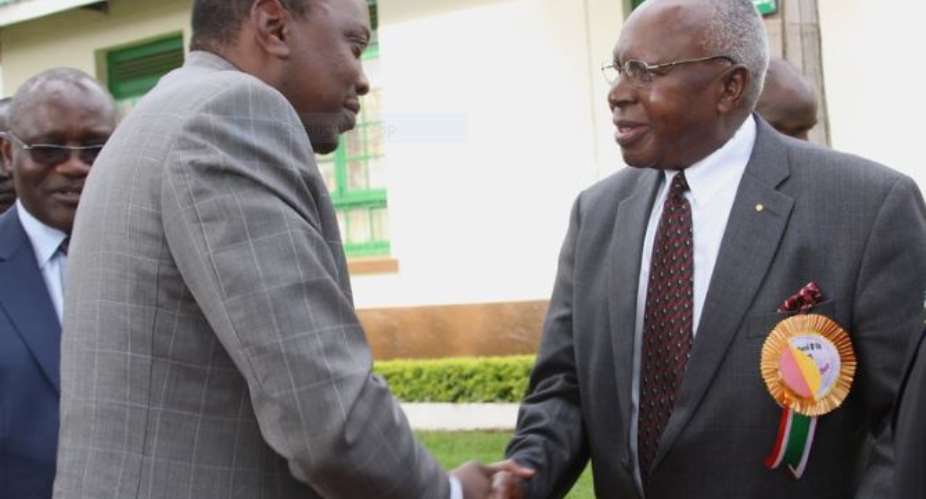 Simeon Nyachae right welcomes President Uhuru Kenyatta to his alma mater, Kisii School in western Kenya, during the institutionamp;39;s 80th anniversary in 2014. - Source: