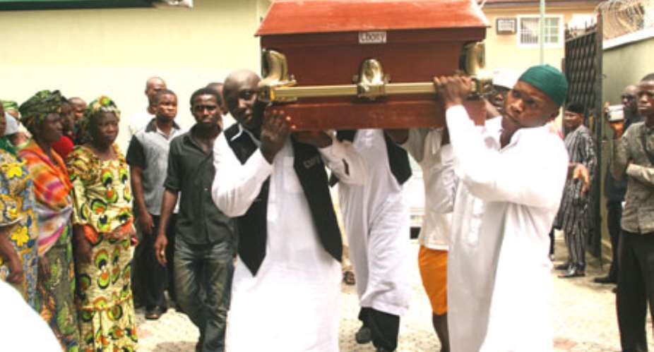 The remains of Alhaja Sherifat Martins being convered by pall bearer this morning at Victoria Garden City, (VGC), Lagos. Photo: Emmanuel Osodi.