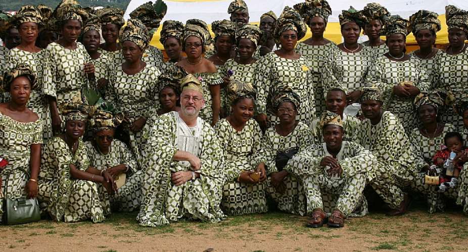A funeral party wearing matching attire, or aso ebi.  - Source: Supreme LaceWikimedia Commons