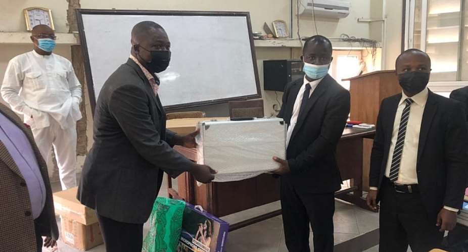 Student donate microphones, receivers, PPE to all three campuses of Ghana Law School