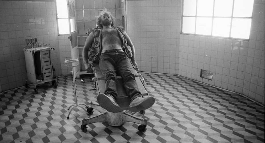 John Liebenberg in the ransacked hospital in Cubal, Angola, in 1993. - Source: Photographer unknownCourtesy the Liebenberg family