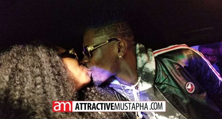 Shatta Wale kisses Shatta Mitchy in his brand new Dodge Charger