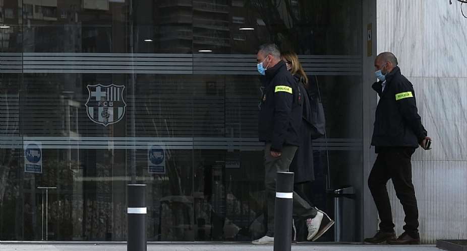 Police officers enter the offices of Barcelona Football Club on March 01, 2021Image credit: Getty Images