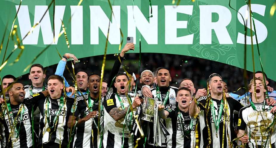 Newcastle hold off Liverpool to claim first major trophy since 1969
