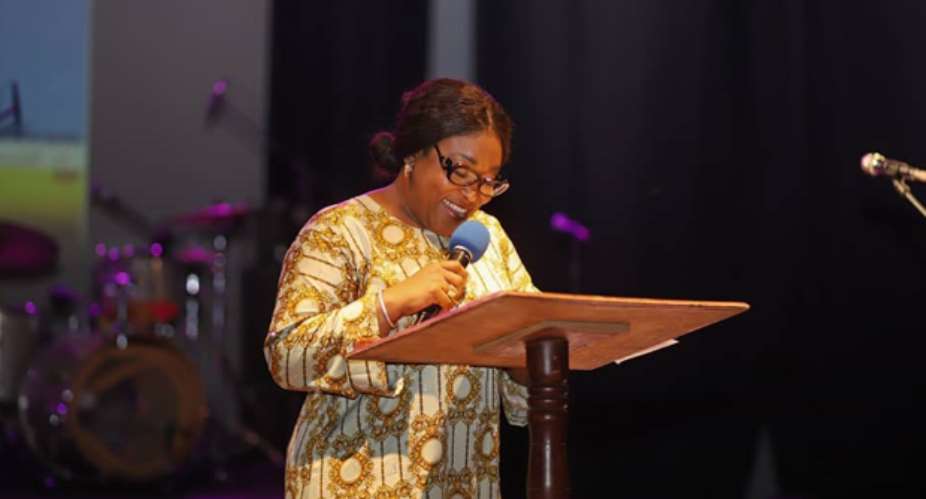 Madam Ayorkor speaking at the event