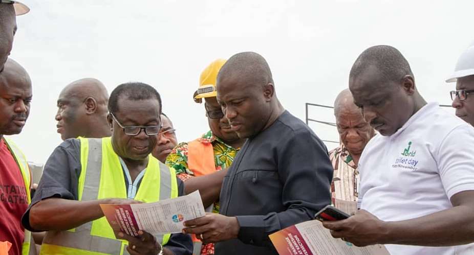 Mohammed Adjei Sowah meets the project Engineers to inspect the project