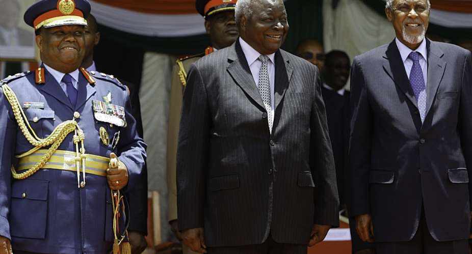 Mohamed Yusuf Hajj right with former President Mwai Kibaki centre, and former Chief of Defence Forces General Julius Waweru Karangi left during a farewell ceremony for Kibaki in 2013.   - Source: EPADaniel Irungu