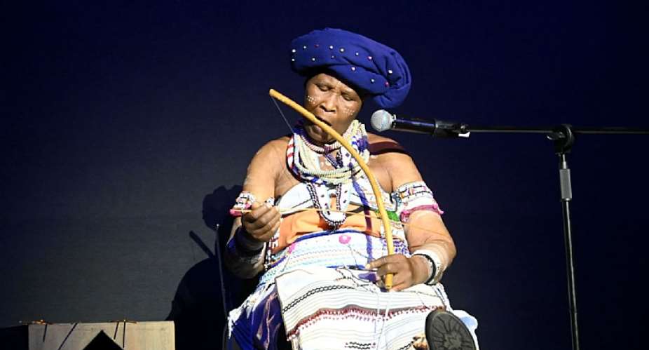 The late musician Madosini playing the umrhube mouthbow. - Source: Oupa BopapeGallo Images via Getty Images