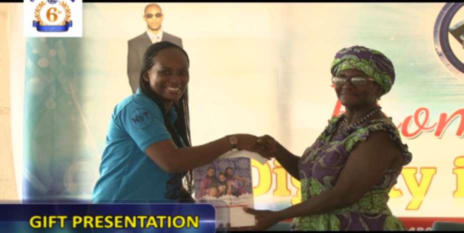 Presentation to Miss Barbara Ennin, right Headmistress Tetteh Ocloo State School for the Deaf