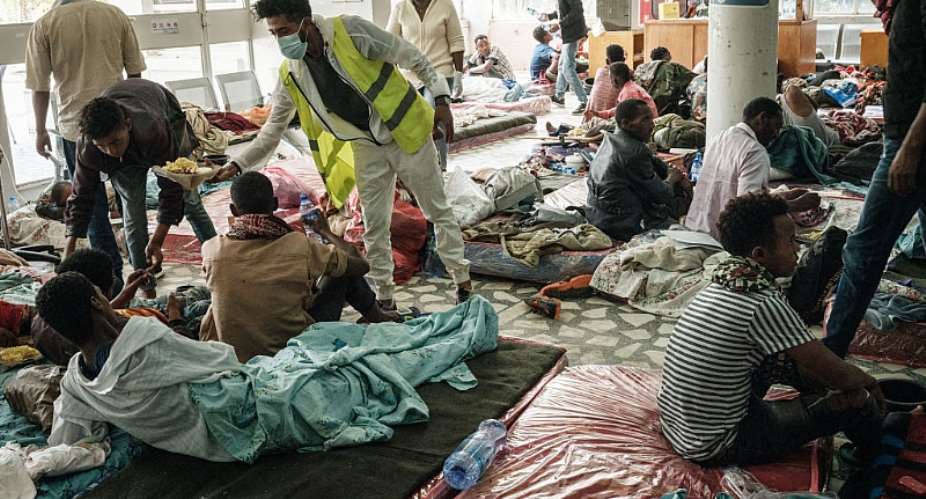 People receiving medical treatment at the entrance hall of Ayder Referral Hospital in Mekele, the capital of Tigray region, Ethiopia - Source: YASUYOSHI CHIBAAFP via Getty Images