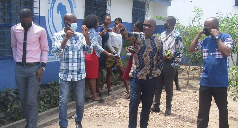 Mr Francis Mensah Akpaloo and Mr Francis Ameyibor interacting after the event