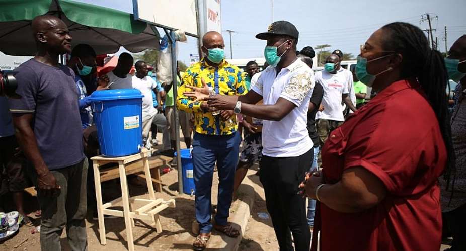 Covid-19: Gyan Donates Sanitizers To Residents Of Weija-Gbawe Constituency