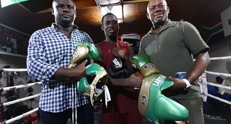 John Laryea receives branded training equipment as he prepares to train and fight in USA