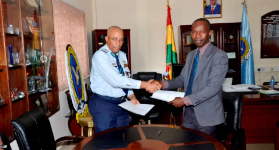 AVM Evans and Mr. Albert Antwi-Boasiako during the signing of the MoU