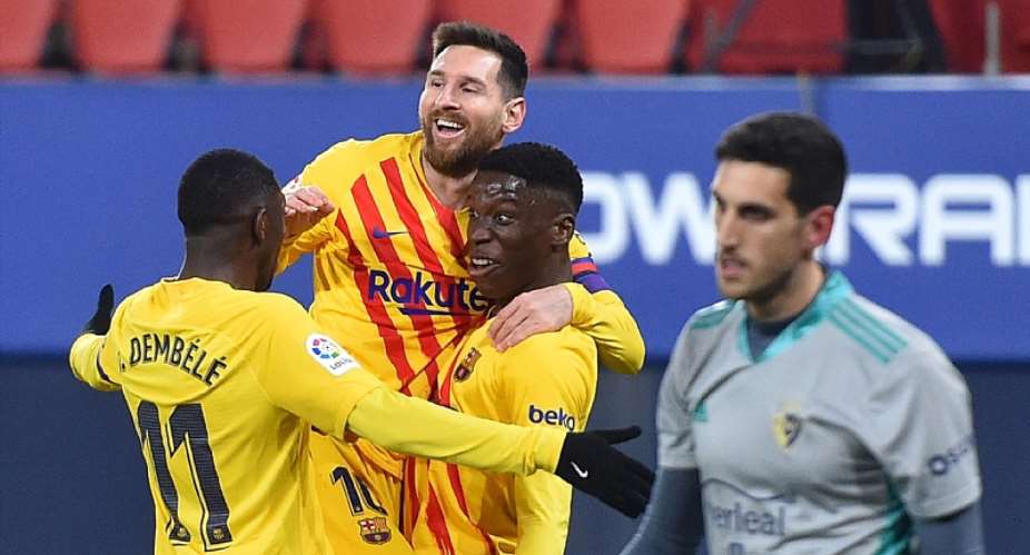 Ilaix Moriba of FC Barcelona celebrates with Lionel Messi and Ousmane Dembele after scoring their team's second goal during the La Liga Santander match between C.A. Osasuna and FC Barcelona at Estadio El Sadar on March 06, 2021 in Pamplona, SpainImage credit: Getty Images