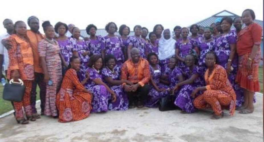 OLAM  women group in group picture after commemorating the International Women in Navrongo