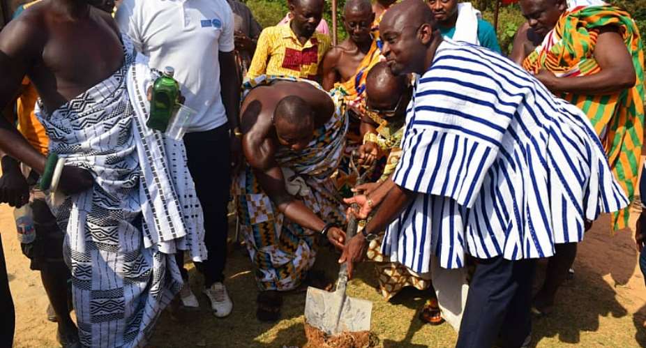 Bosome Freho MP cuts sod for construction of an Astroturf at Asiwa