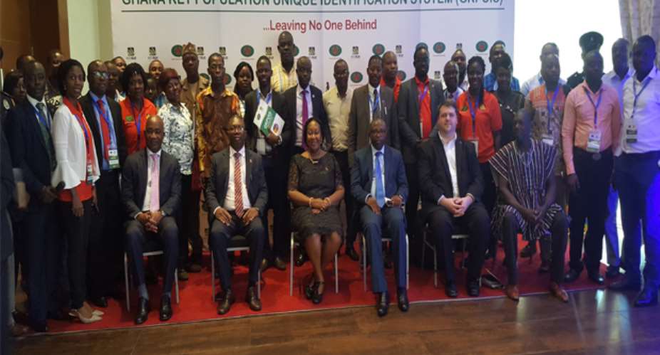 Alexander K K Abban, Kyeremeh Atuahene, Mark Addo and other chief executives of development partners in a group photograph at the launch of GKPUIS