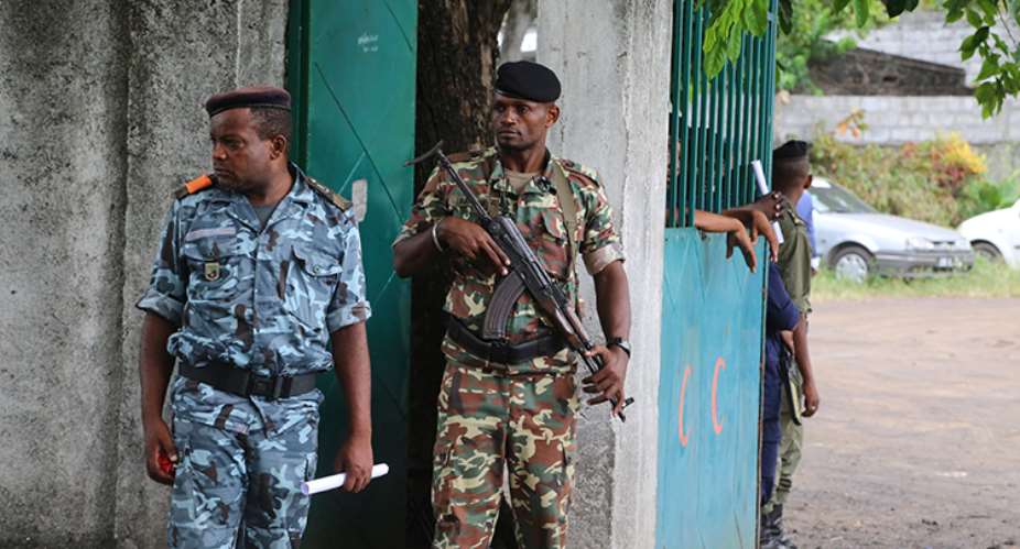 Soldiers stand guard on April 2, 2019, in Moroni, the capital of the Comoros. Journalists have been detained and newspapers have been disrupted surrounding the country's recent presidential election. AFPYoussouf Ibrahim